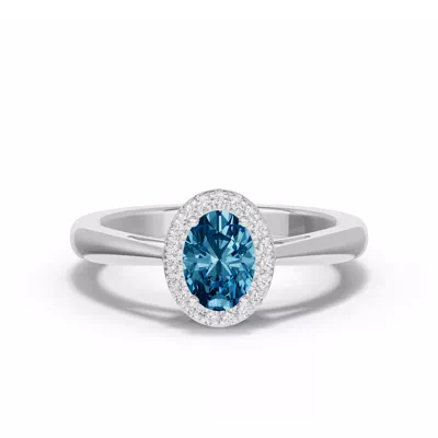 Oval Blue Topaz Lab Diamond Halo Ring