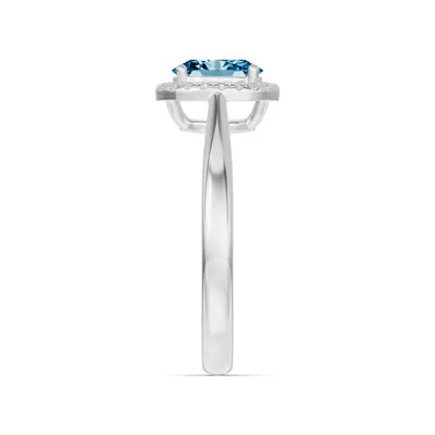 Oval Blue Topaz Lab Diamond Halo Ring