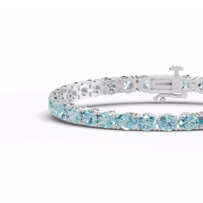 Oval Sky Blue Topaz Tennis Bracelet