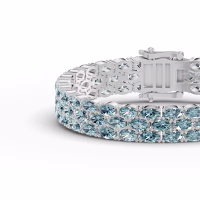 Triple Row Oval Swiss Blue Topaz Bracelet